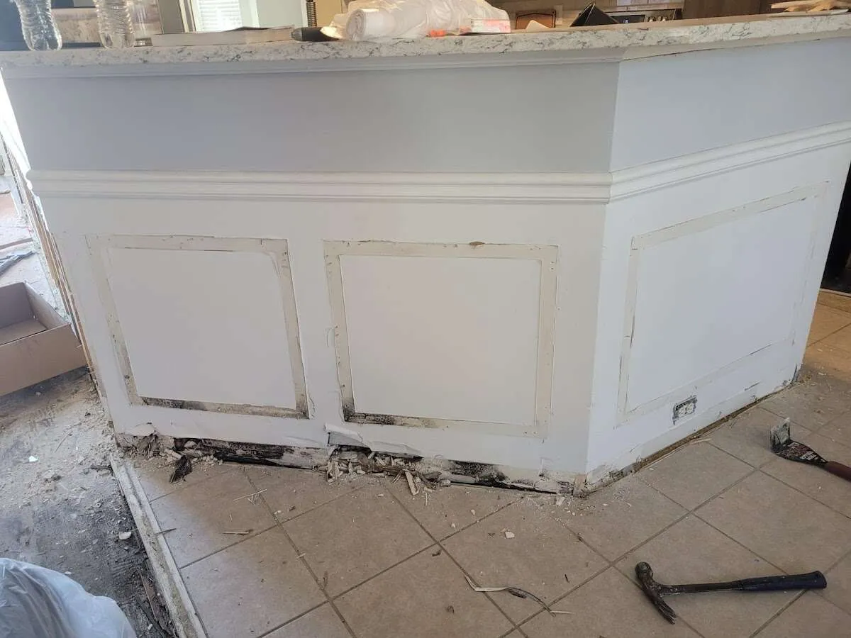 Water damage and mold on kitchen during Storm Damage Restoration in Millville